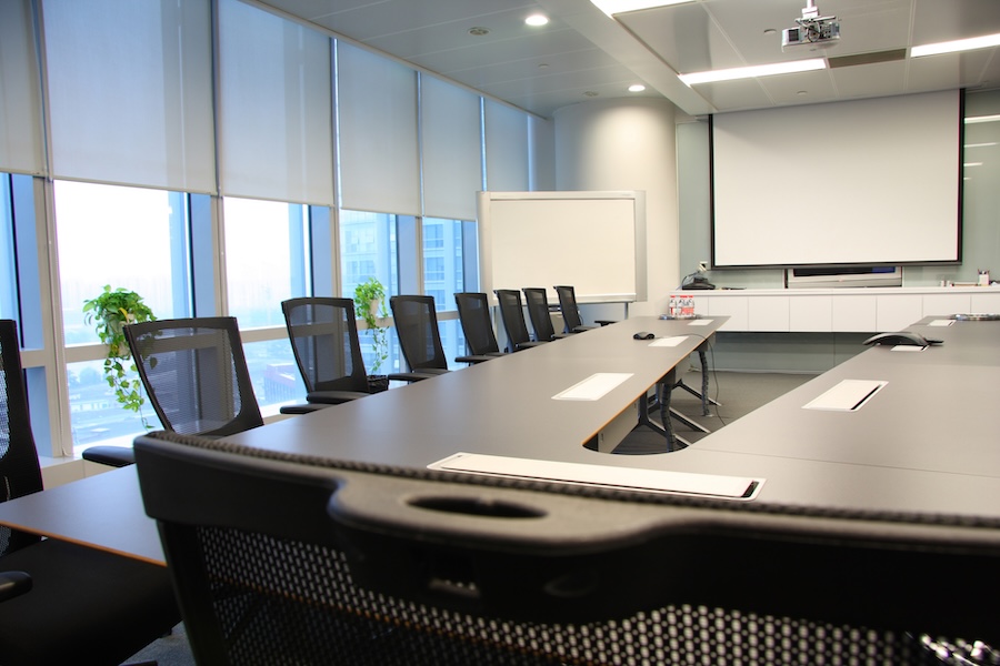 A meeting space with a collaborative AV system.