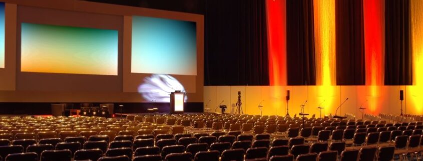 An auditorium with commercial audio, video, and lighting.