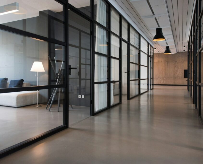 hallway between glass-panel doors